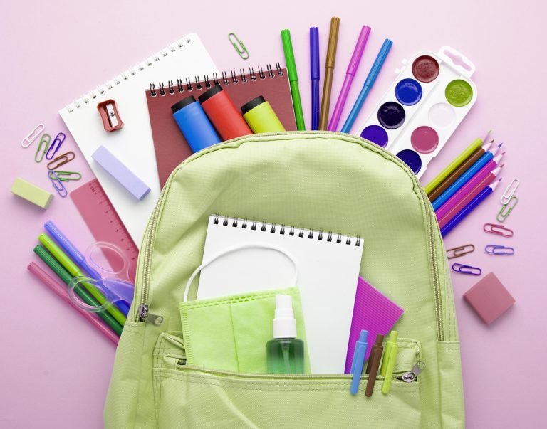 top-view-back-school-stationery-with-backpack-pencils