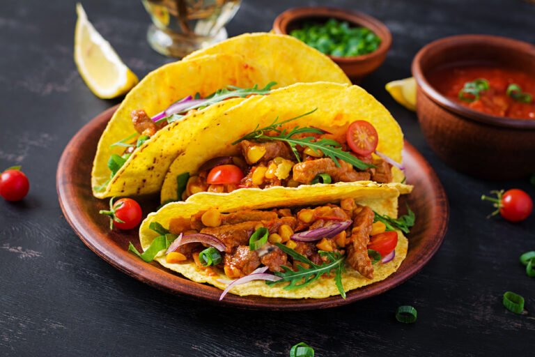 delicious-tacos-on-a-wooden-plate-2026-03-19-08-09-16-utc (1)