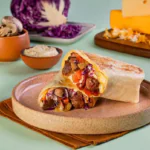 Aussie Chicken & More estreia na categoria de wraps e leva seu DNA Sweet & Spicy para um novo formato