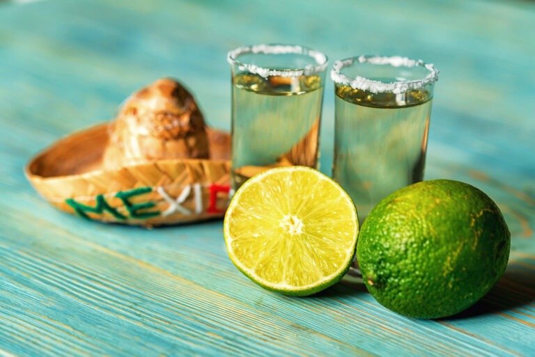 Tequila with lime and salt, selective focus