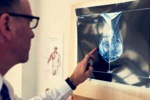Doctor is checking patient x-ray film