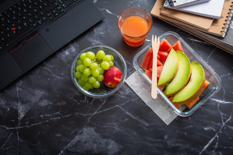 Healthy snack at office workplace, organic vegan meals from take away lunch box